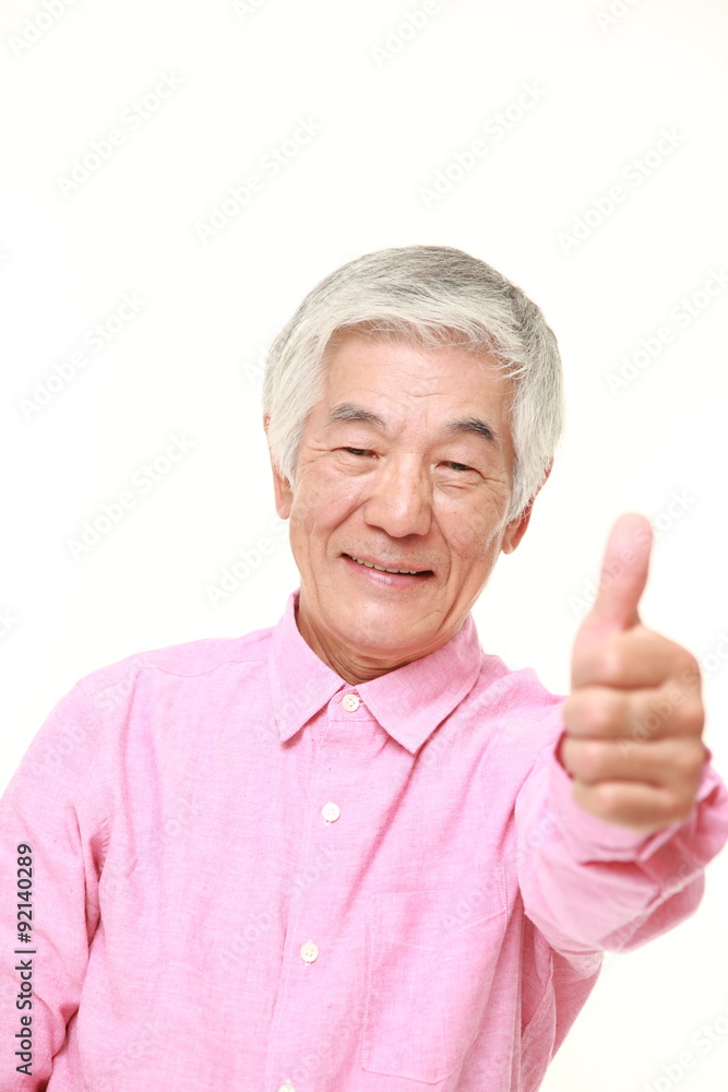 senior Japanese man with thumbs up gesture senior Japanese man with thumbs up gesture