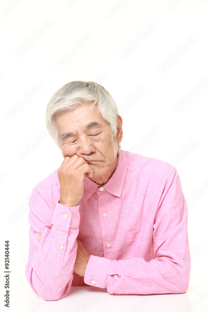 senior Japanese man sleeping on the table senior Japanese man sleeping on the table