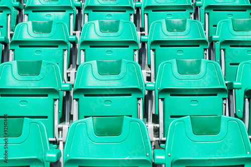 green plastic seat on stadium