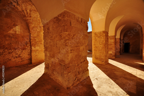 Valokuvatapetti Columns and archways of Kasimiye Madrasah form Mardin,Turkey.