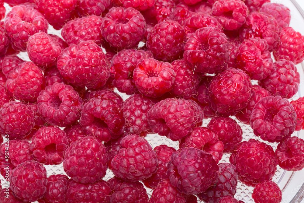 A beautiful selection of freshly picked ripe red raspberries. A beautiful selection of freshly picked ripe red raspberries.