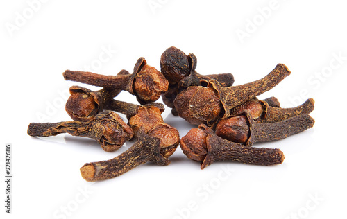 Spice cloves on white background photo