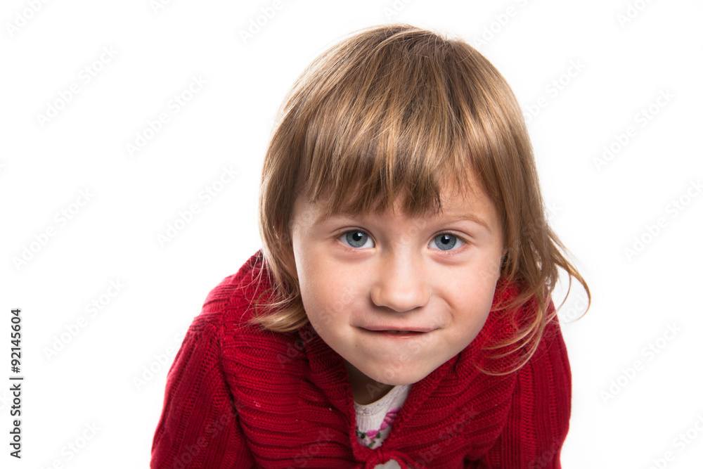 The girl looks in the frame on. Red sweater The girl looks in the frame on. Red sweater
