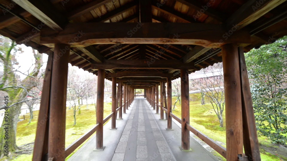 POV walking on hallway through traditional Japanese garden in Toufuku-ji in Kyoto, Japan POV walking on hallway through traditional Japanese garden in Toufuku-ji in Kyoto, Japan