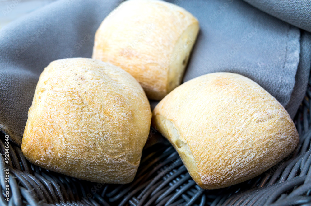 bread in basket - little roll breads in basket on table bread in basket - little roll breads in basket on table