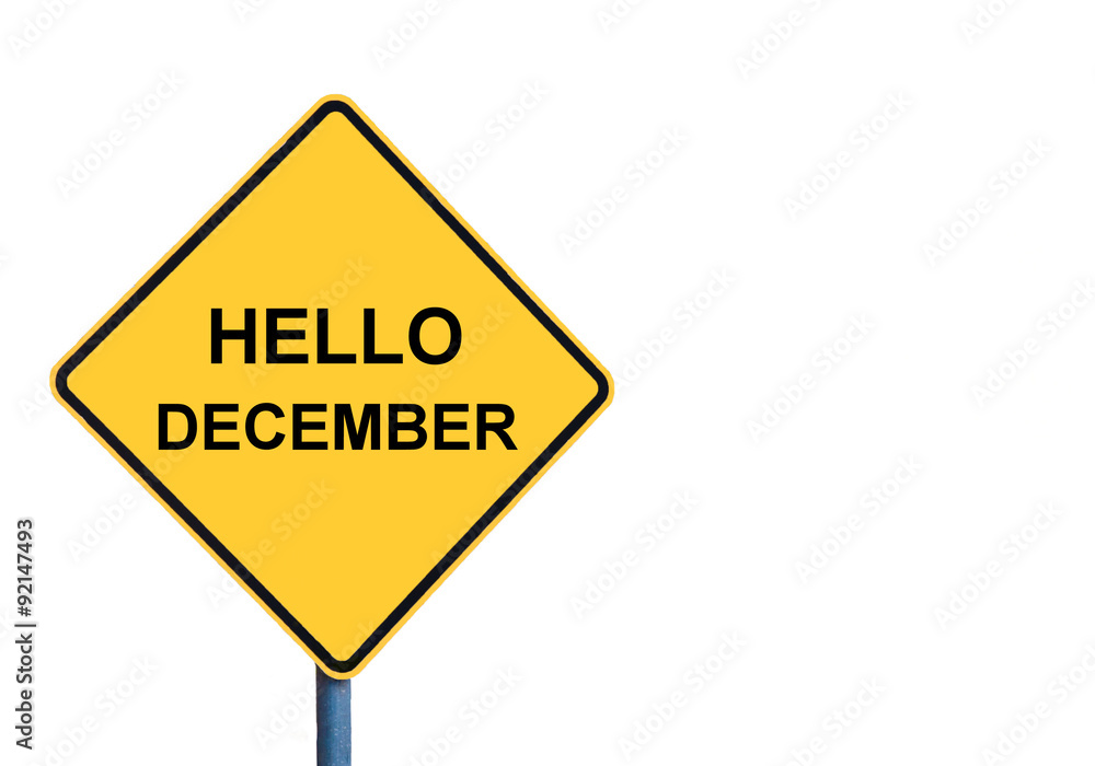 Yellow roadsign with HELLO DECEMBER message Yellow roadsign with HELLO DECEMBER message