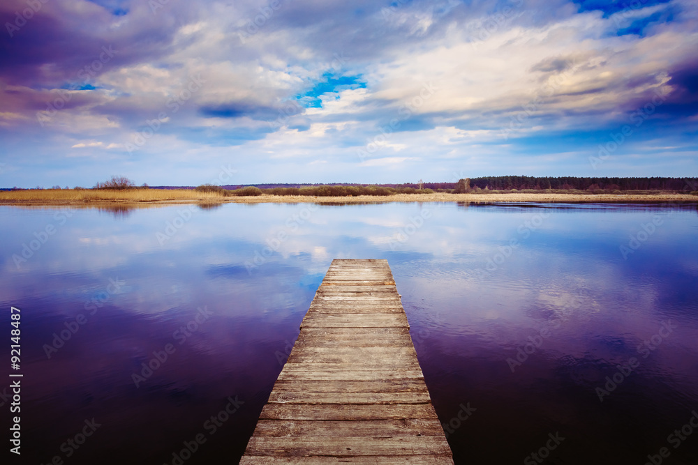 Old Wooden Pier. Calm River