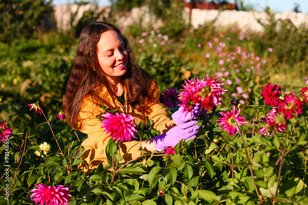 Young woman in garden. Young woman in garden.