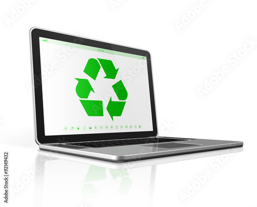 Fototapeta Naklejka Na Ścianę i Meble -  Laptop computer with a recycling symbol on screen. environmental