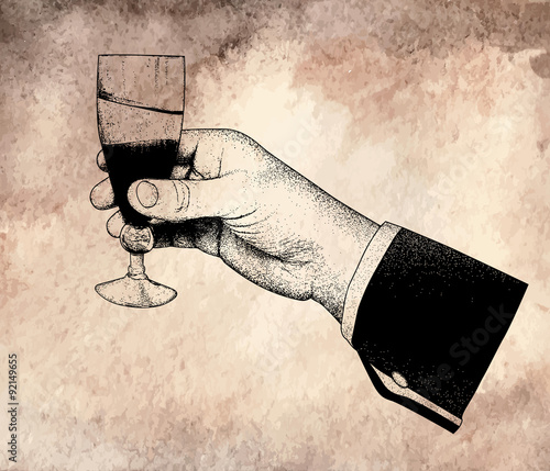 The man's hand holding glasses of champagne