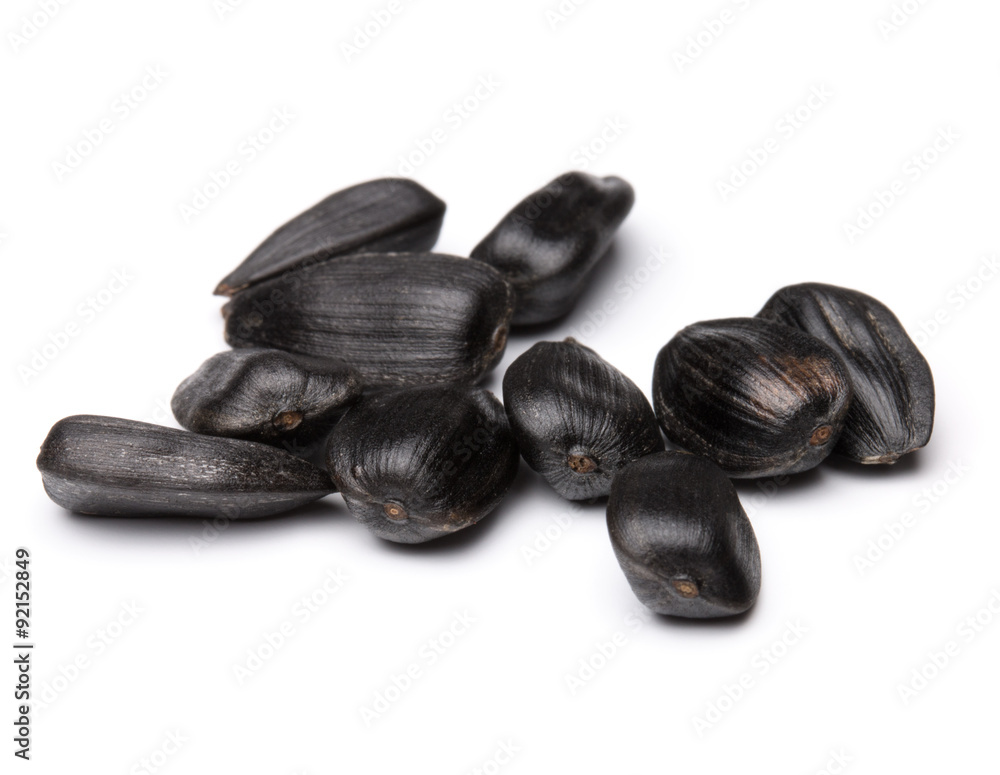 Sunflower seeds isolated on white background close up Sunflower seeds isolated on white background close up