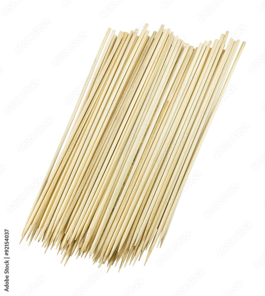 Stack of Wooden Skewers on A White Background Stack of Wooden Skewers on A White Background