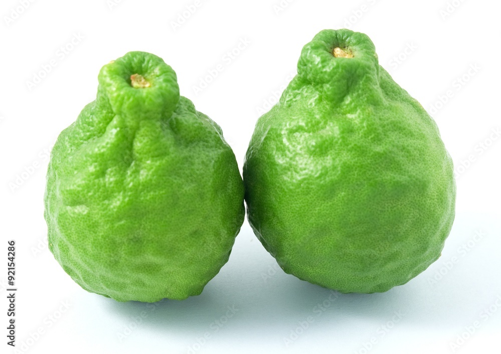 Two Kaffir Lime Fruits on White Background Two Kaffir Lime Fruits on White Background