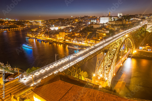 Panorama of lighted famous bridge Ponte dom Luis above Old town
