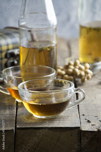  Cup of Healthy Tea over wood background