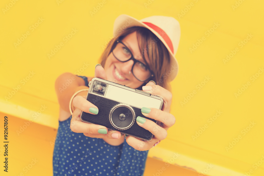 Hipster girl with old camera. Hipster girl with old camera.