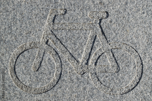 Bike lane sign engraved in granite