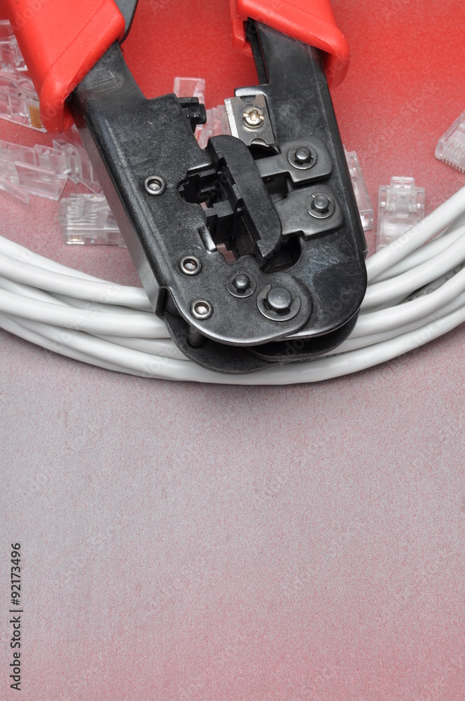 Obraz premium Crimping tool with network cable and connectors