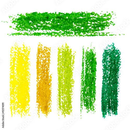 Set of yellow and green crayons stains