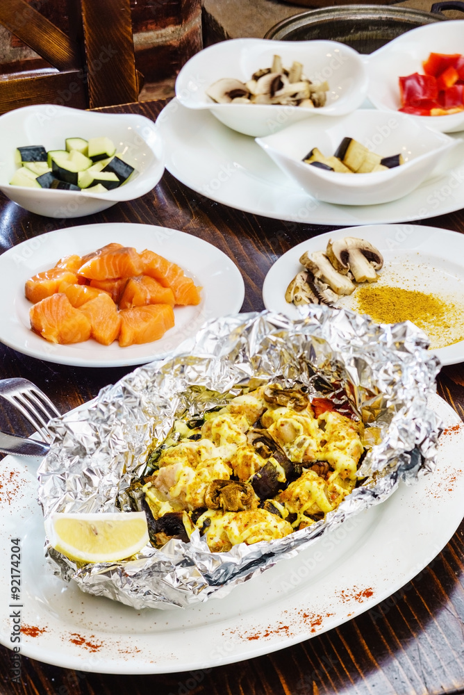 fish with vegetables in the foil fish with vegetables in the foil
