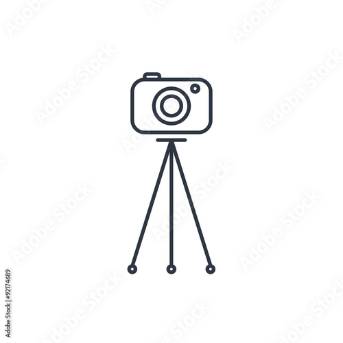 Camera on tripod outline icon