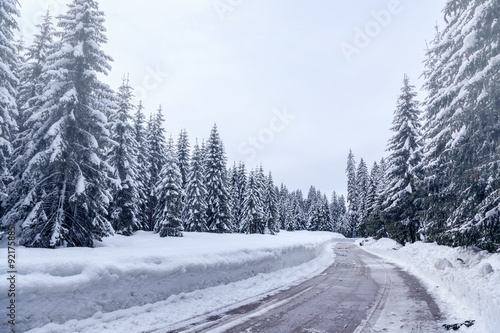 Snowy winter road in Julian Alps