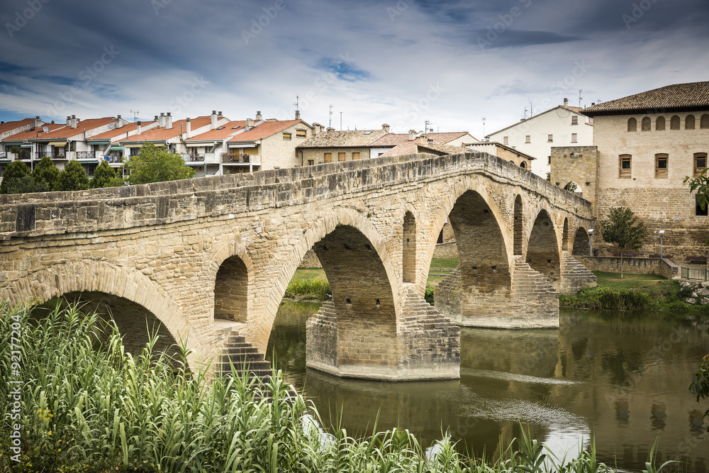 ancient Roman bridge over Arga river in Puente la Reina - Gares, Spain