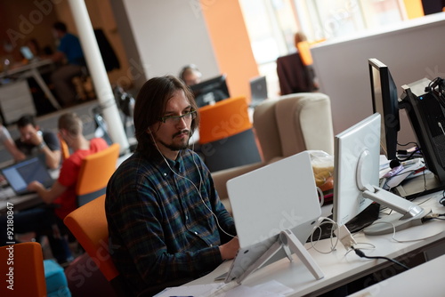 startup business, software developer working on computer