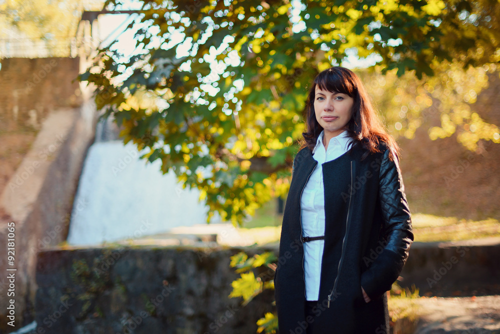beautiful girl 30 years in business suit walking in the autumn forest beautiful girl 30 years in business suit walking in the autumn forest