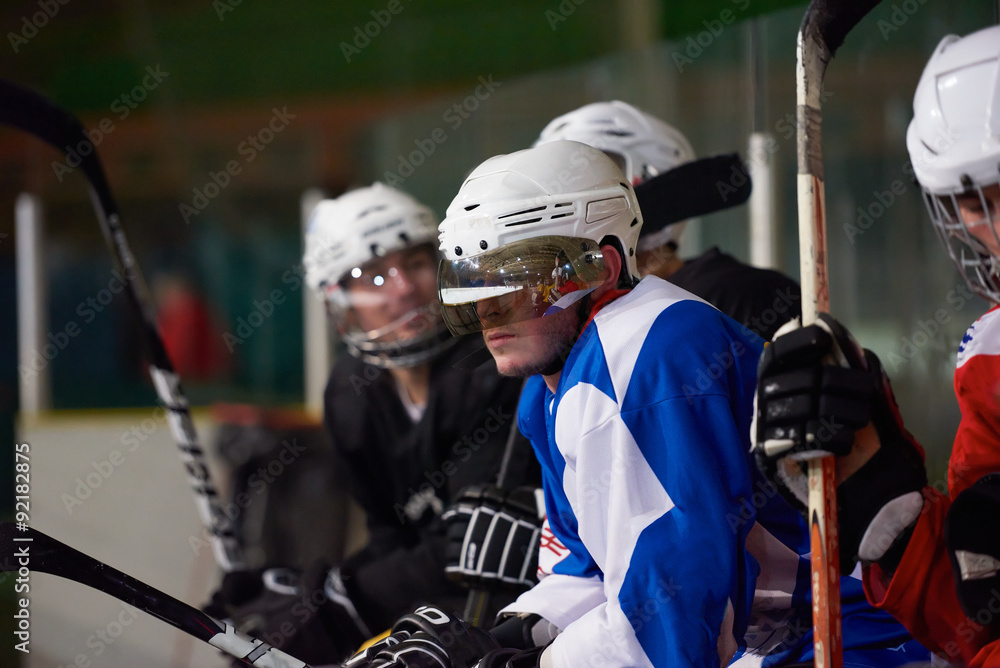 Fototapeta premium ice hockey players on bench