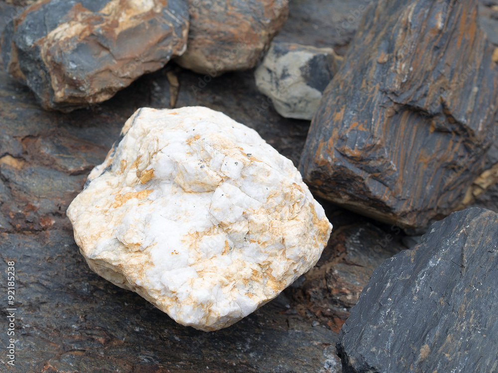 White stone with orange shades between others. White stone with orange shades between others.