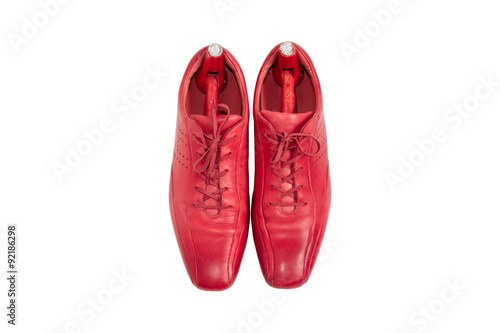 Male fashion leather shoes crimson color and shoe trees vintage