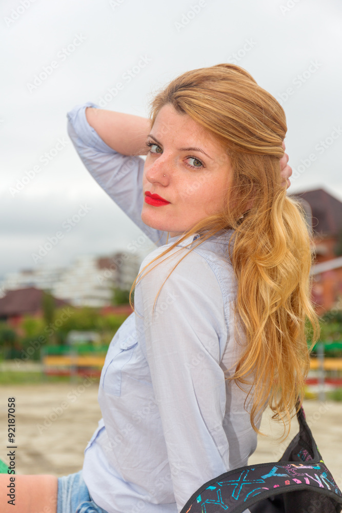 Young beautiful woman urban style