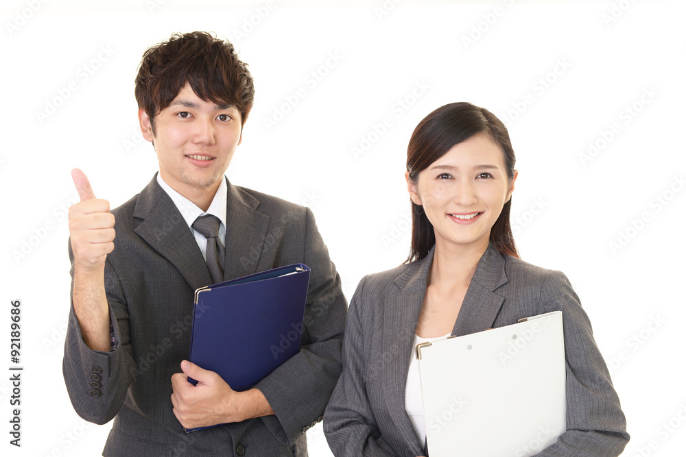 笑顔のビジネスマンとOL