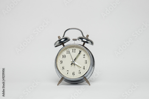 Alarm clock on white background