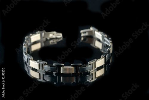 jewelry and bracelets on a black background 