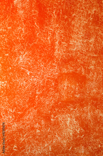 orange wall painted with textured paint roller