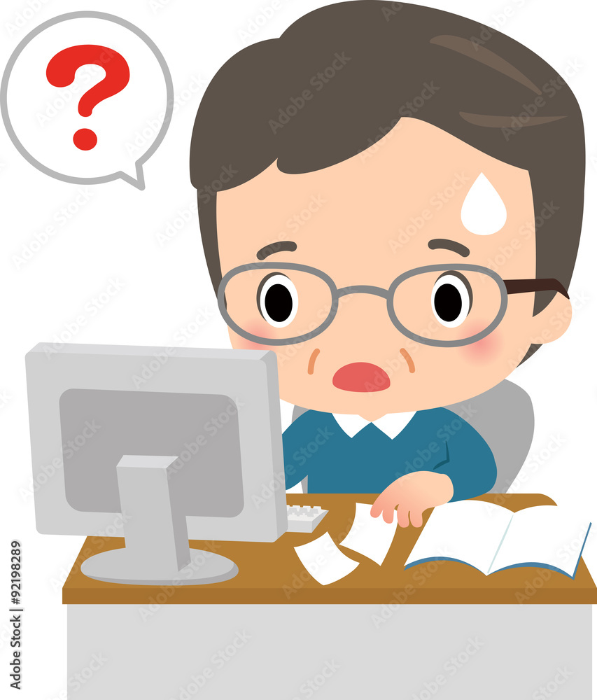パソコンと書類と困っている男性