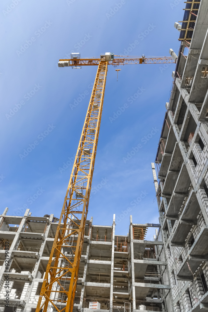 New multistorey housing and industrial cranes