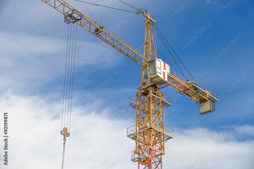 Multistorey housing under construction and construction cranes
