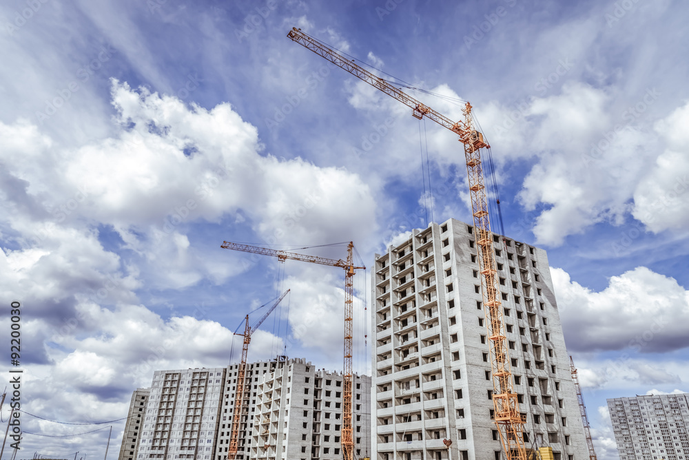 New high-rise building and construction cranes New high-rise building and construction cranes