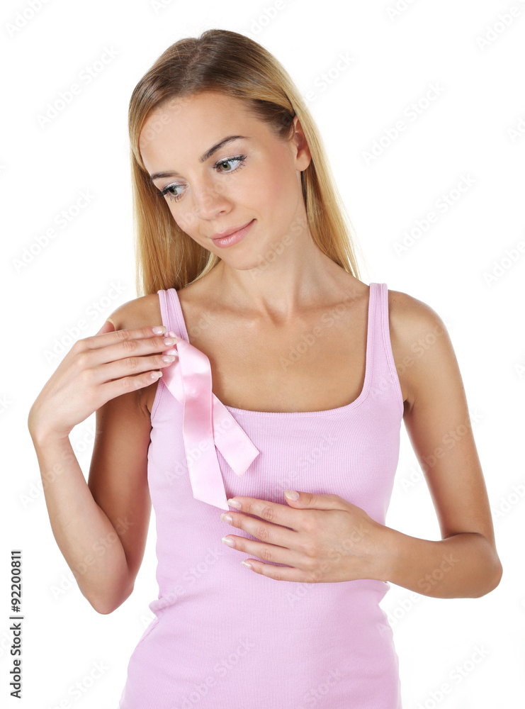 Woman using pink ribbon on her chest isolated on white Woman using pink ribbon on her chest isolated on white