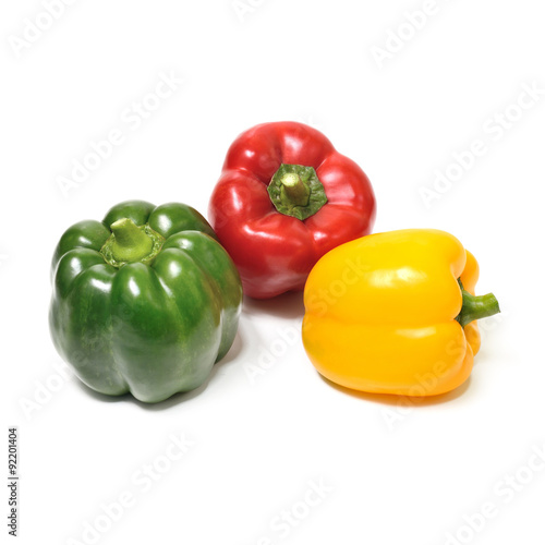 Colorful peppers over white background (Vegetable)