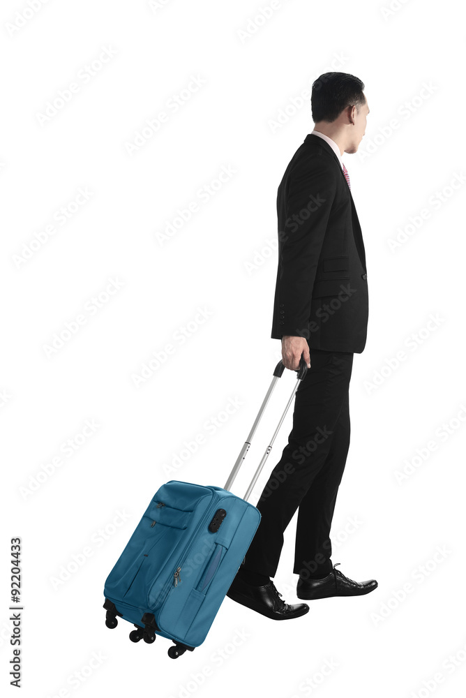 Back view of business man walking with suitcase Back view of business man walking with suitcase