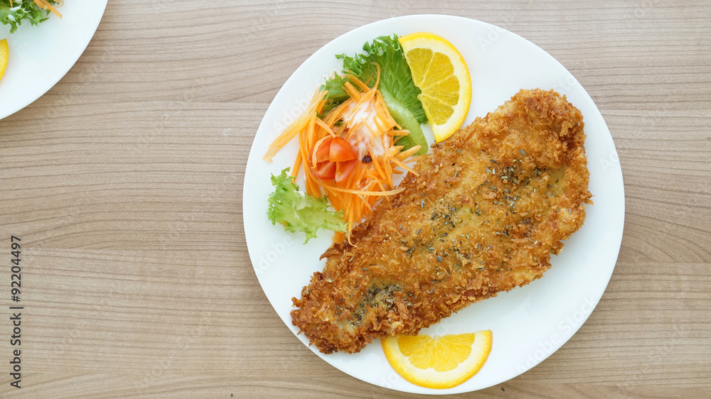 battered fish steak with salad and vegetable battered fish steak with salad and vegetable