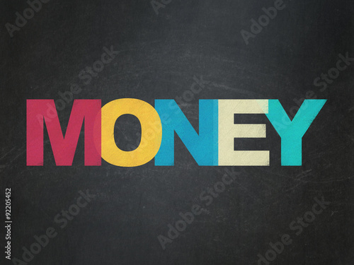Finance concept: Money on School Board background