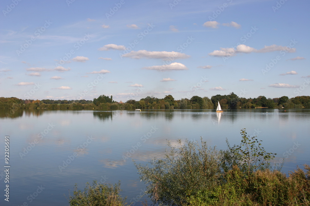 Reservoir with sailing yacht