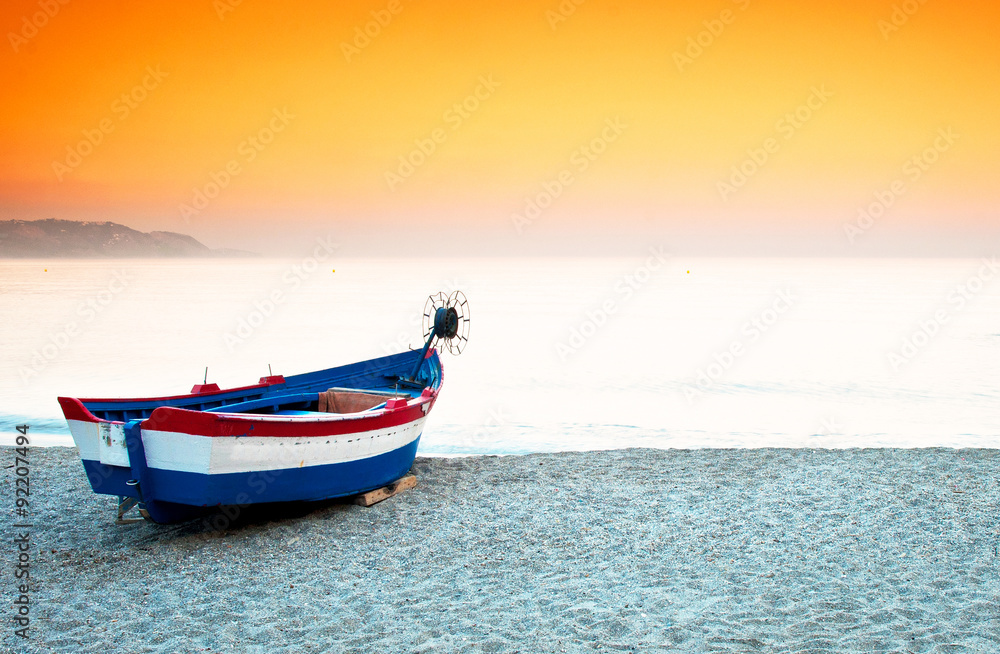 Boat in sunset