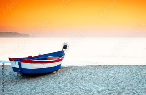 Fototapeta Naklejka Na Ścianę i Meble -  Boat in sunset