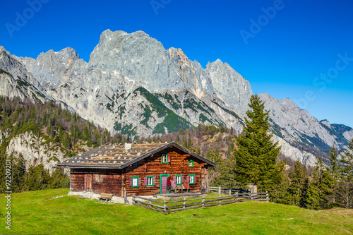 Traditional mountain chalet in the Alps in autumn